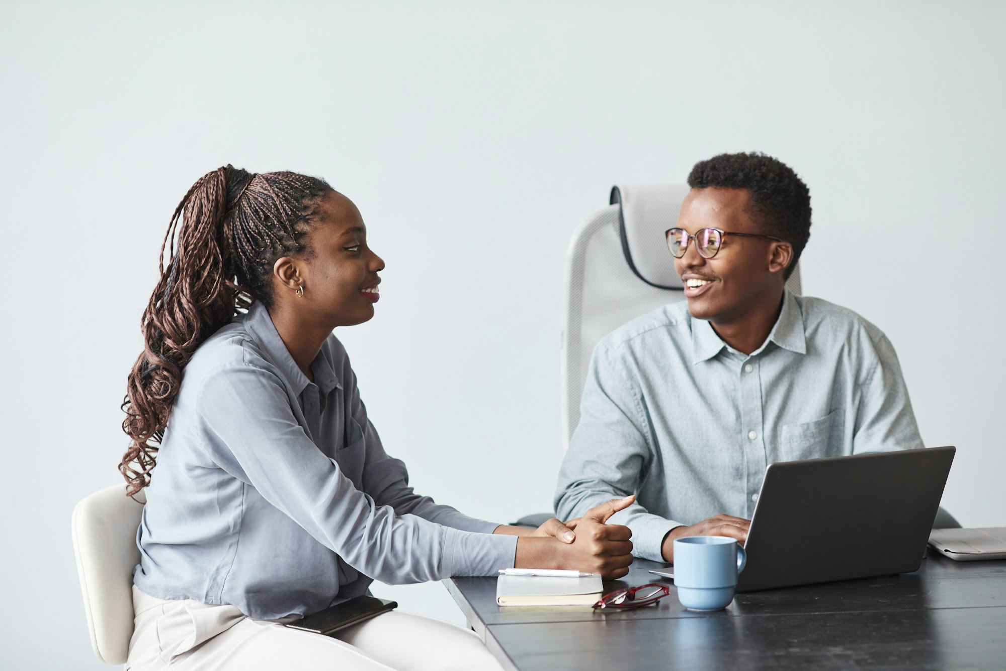 Two Young African American People in Office